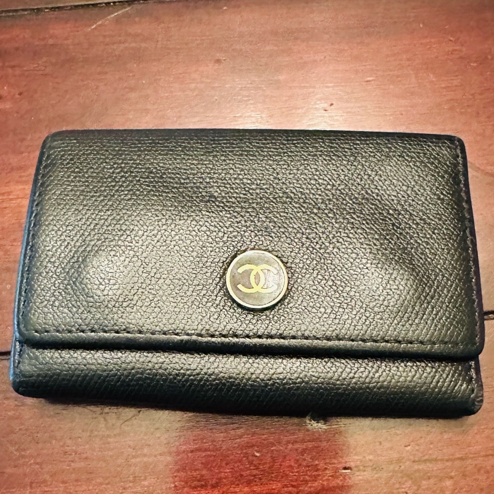 CHANEL Black Textured key chain  with Gold Logo can be used as a card holder to